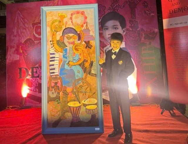 Teenager opens painting exhibition raising funds for building boarding school