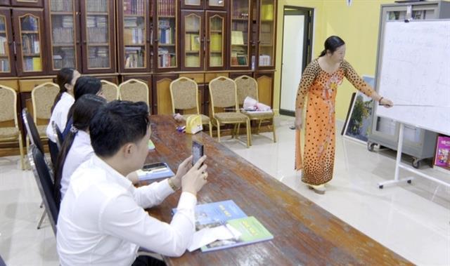 Vietnamese book corner fosters language, cultural exchange in Laos

