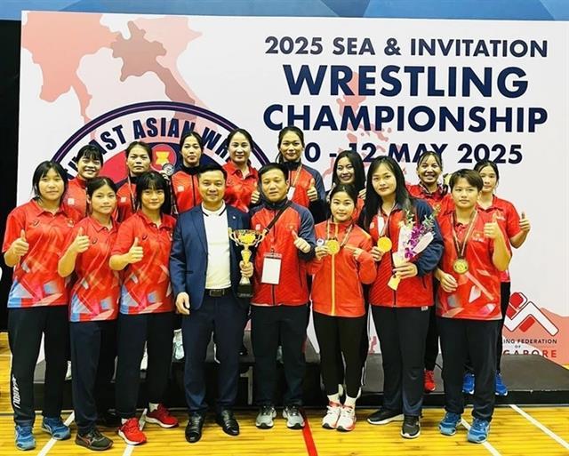 Việt Nam again dominate regional wrestling championships

