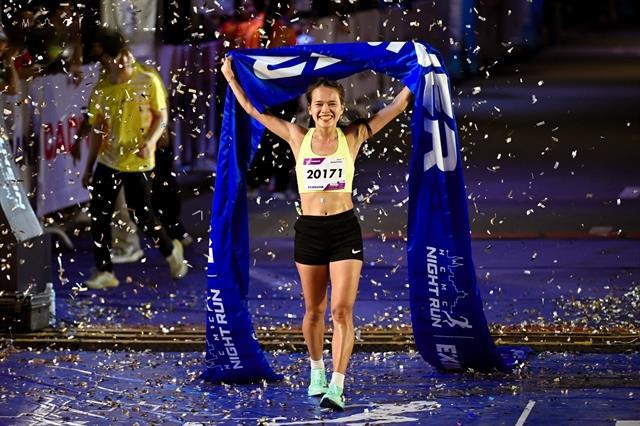 Phan, Lệ win HCM City Night Run Eximbank