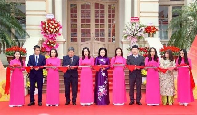Photo exhibition celebrates 14th National Party Congress, Lunar New Year