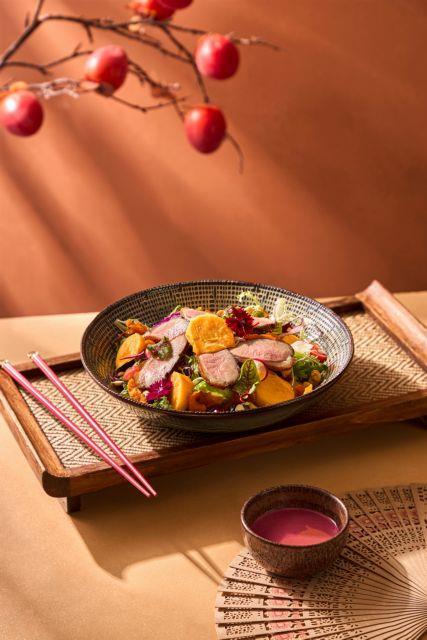 Smoked duck and golden persimmon salad