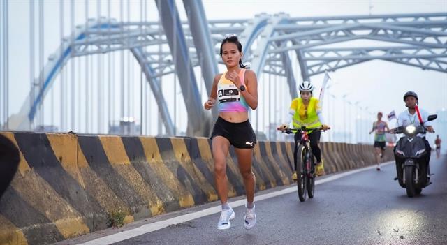Khôi, Lệ claim titles at 2026 Techcombank Hanoi International Marathon