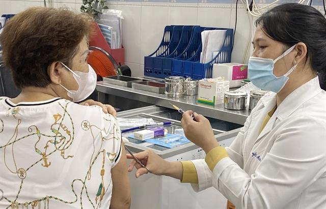 Getting vaccinations for Việt Nam