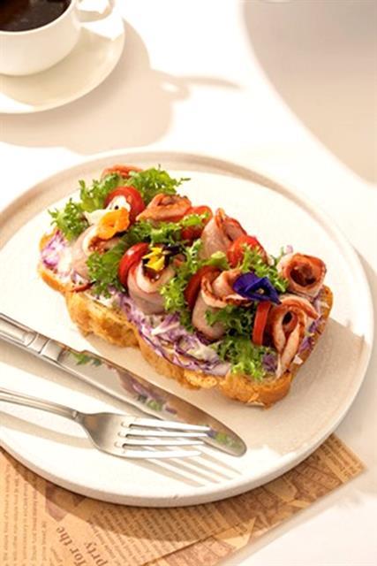 Smoked duck and coleslaw brioche sandwich