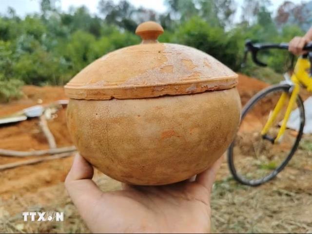 Excavation of ancient brick tomb unearths iron swords, other artefacts